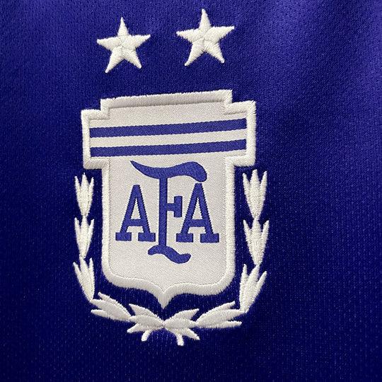 Maillot Argentine 2022/23 Coupe du Monde Le 12, maillot de football bleu avec logo et détails argentins.