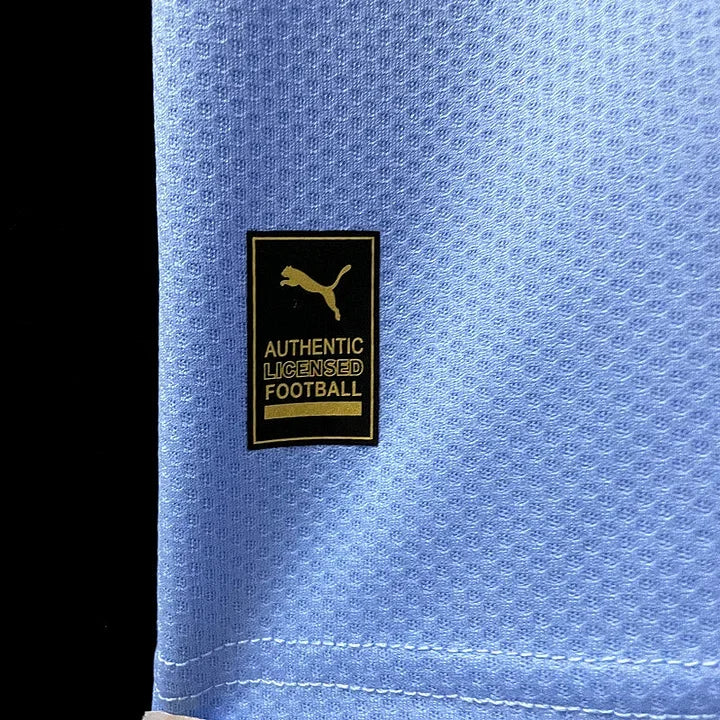 Maillot domicile Manchester City 2022/23 Le 12 -ème Maillot, maillot de football avec logo et design officiel, vue frontale.