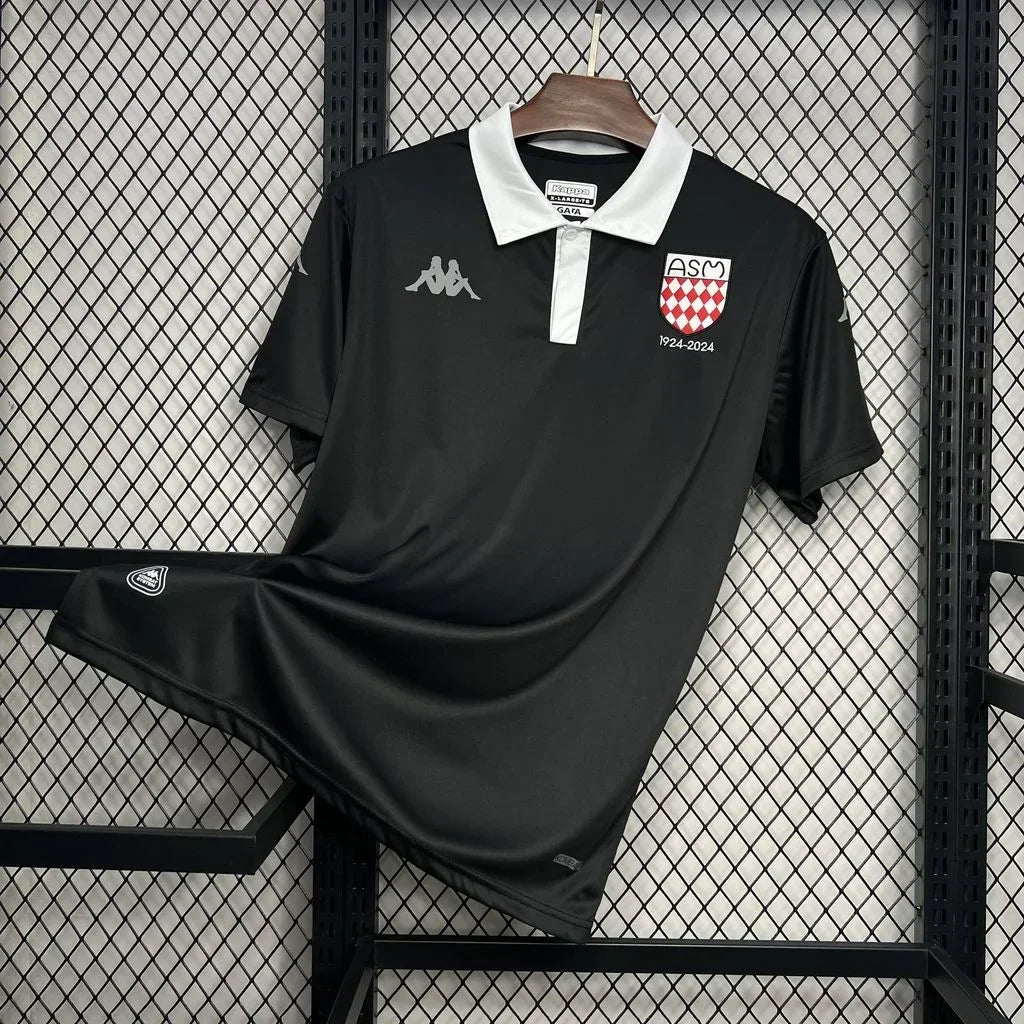 Maillot de football noir AS Monaco 2024 2025, marque Le 12 -ème Maillot, vue de face avec logo et détails du maillot.