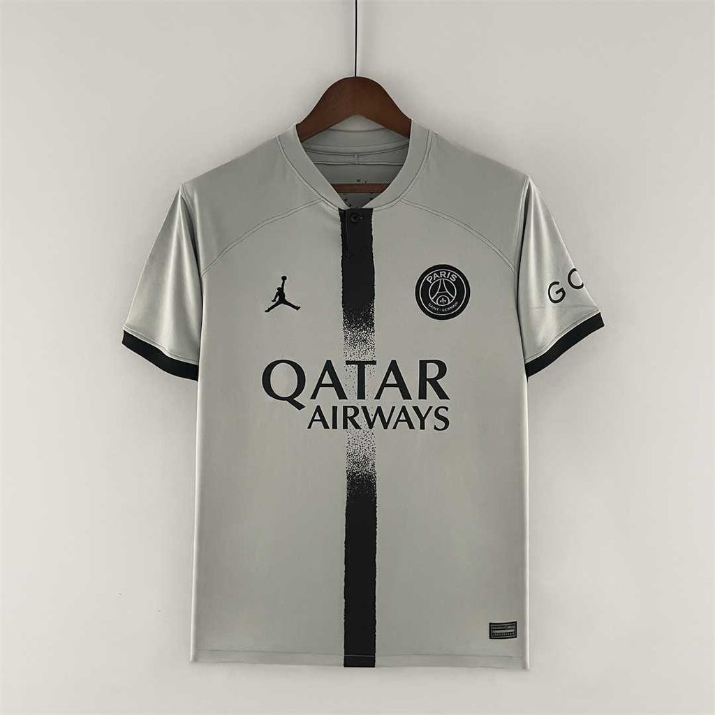 Maillot extérieur rétro PSG 2022-2023 Le 12-ème Maillot, jersey de football avec logo et design vintage visible sur l'image.