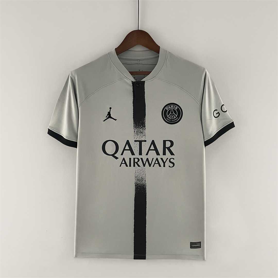 Maillot extérieur rétro PSG 2022-2023 Le 12-ème Maillot, jersey de football avec logo et design vintage visible sur l'image.