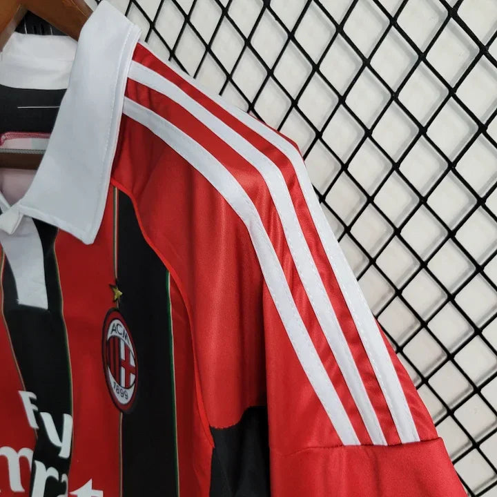 Maillot rétro de football AC Milan 2012-2013, marque Le 12-ème, vue de face avec logo et détails du design vintage.