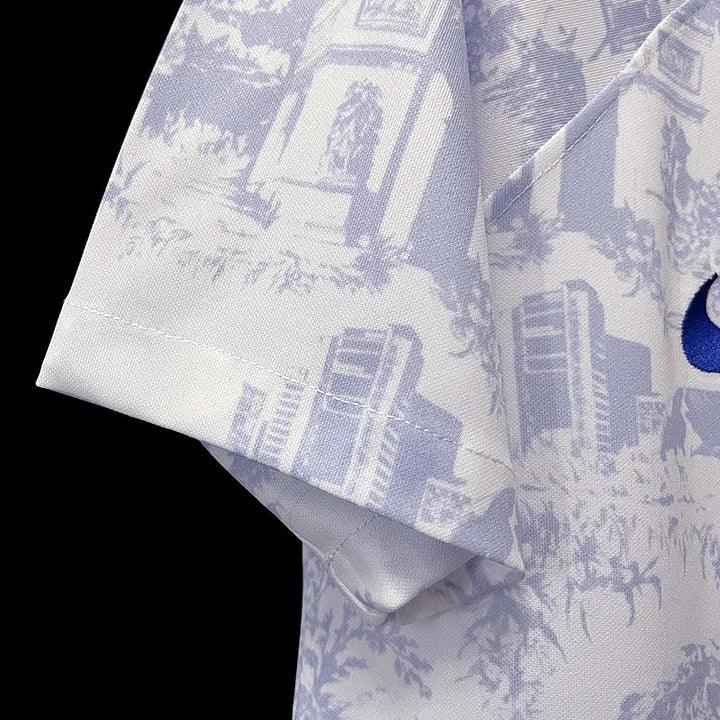 Maillot extérieur de l'équipe de France 2022-2023, marque Le 12, pour la Coupe du Monde, vue de face avec logo et détails.