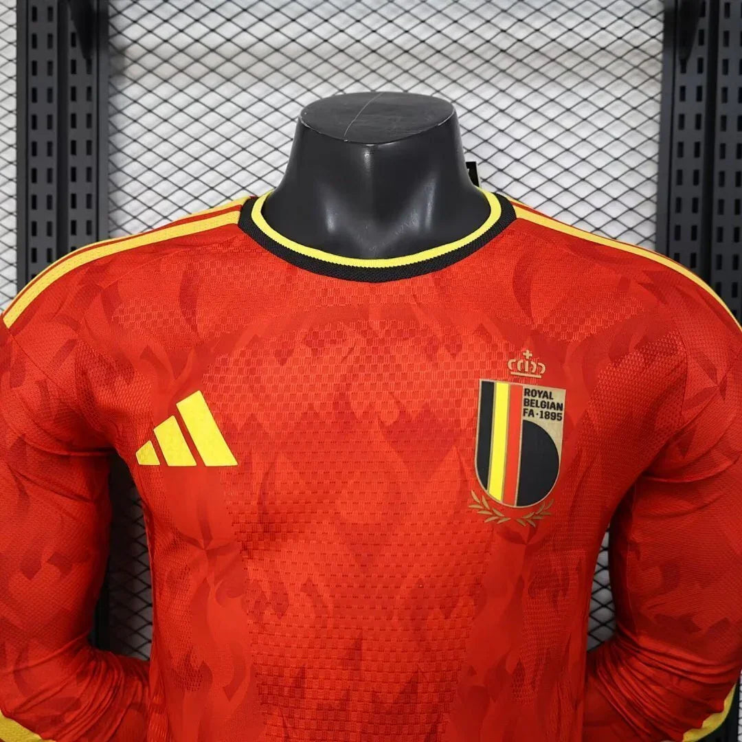 Maillot Belgique manches longues Coupe du monde 2026, Le 12 -ème Maillot, devant avec logo et détails en bleu et noir.