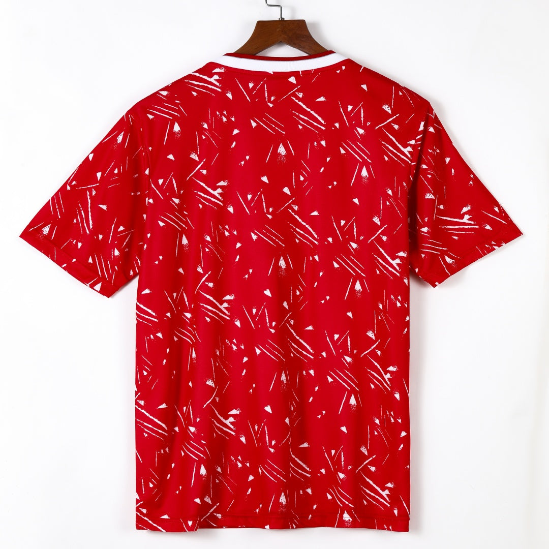 Maillot domicile rétro de Liverpool 1989-1991 par Le 12, maillot de football rouge avec logo et détails d'époque visible.