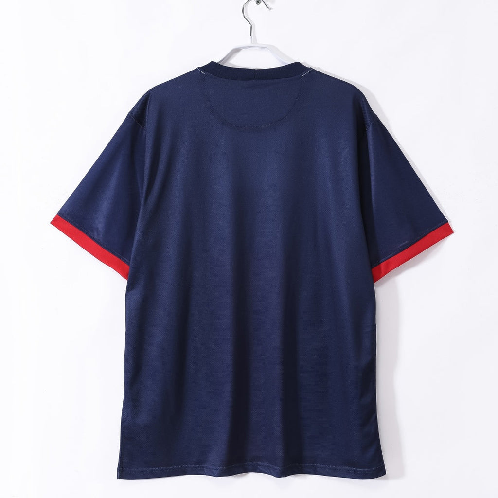 Maillot domicile rétro du PSG 2013-2014, marque Le 12-ème Maillot, avec le logo du club et le design classique.