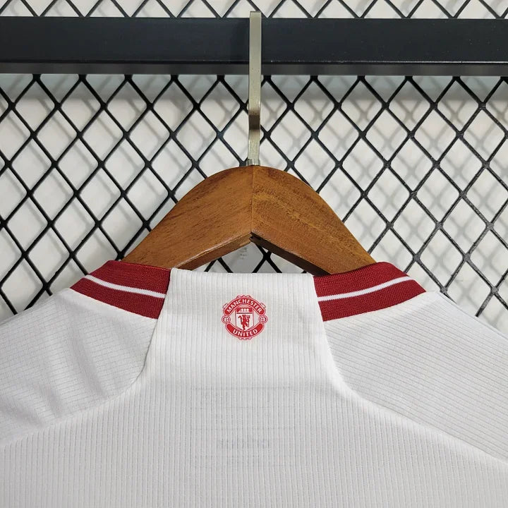 Maillot extérieur Manchester United 2023 2024 Le 12 -ème Maillot, maillot de football avec logo et design officiel.