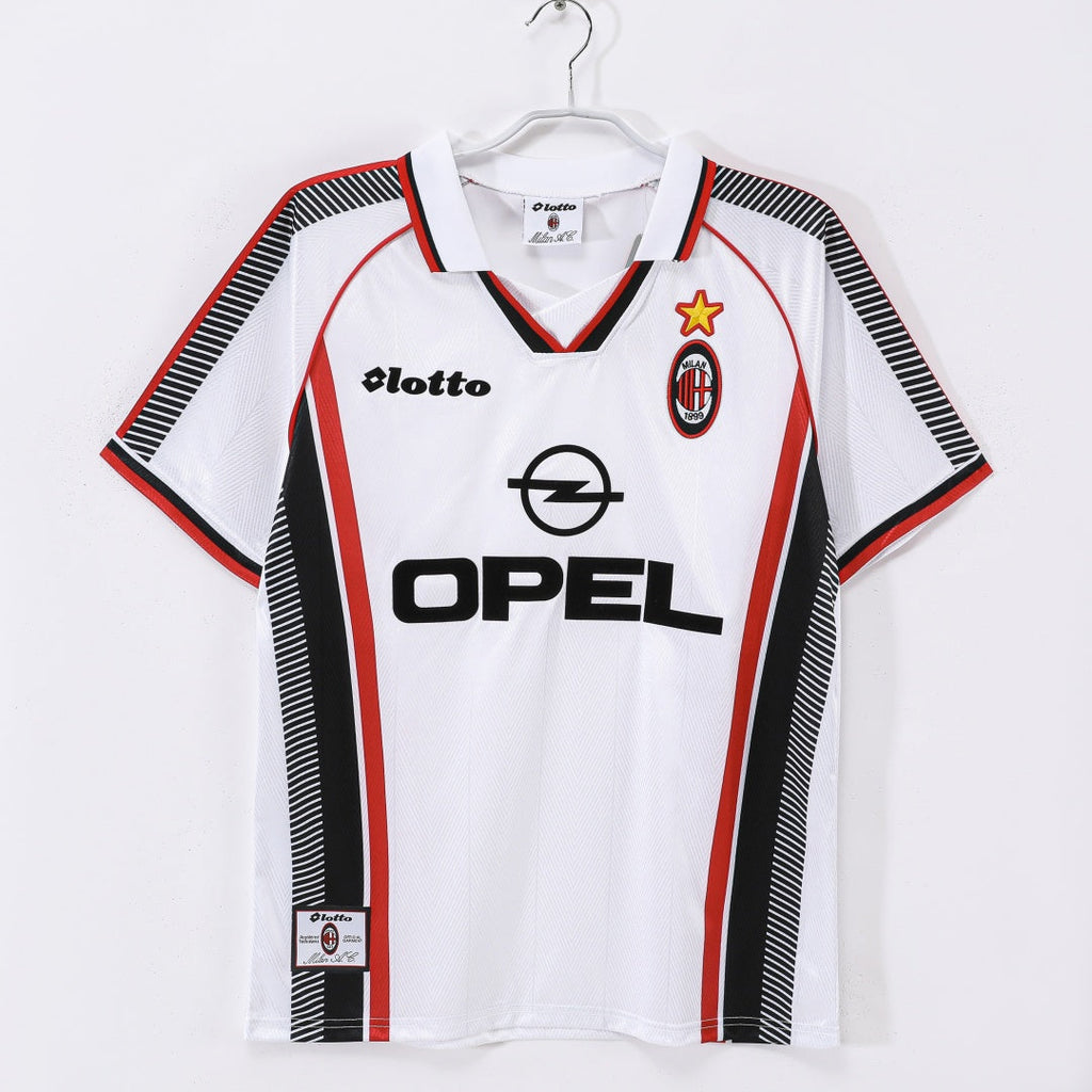 Maillot extérieur rétro de l'AC Milan 1997-1998, marque Le 12-ème Maillot, vue du devant avec logo et détails du maillot.