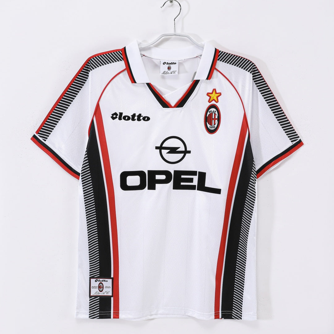 Maillot extérieur rétro de l'AC Milan 1997-1998, marque Le 12-ème Maillot, vue du devant avec logo et détails du maillot.