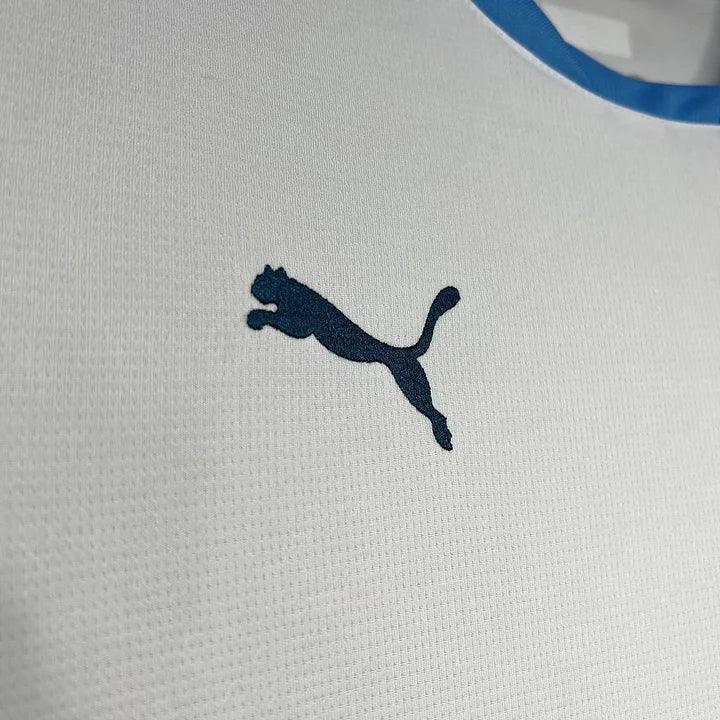 Maillot Olympique de Marseille saison 2024-25 de la marque Le 12-ème Maillot, vue de face avec logo et détails du design.