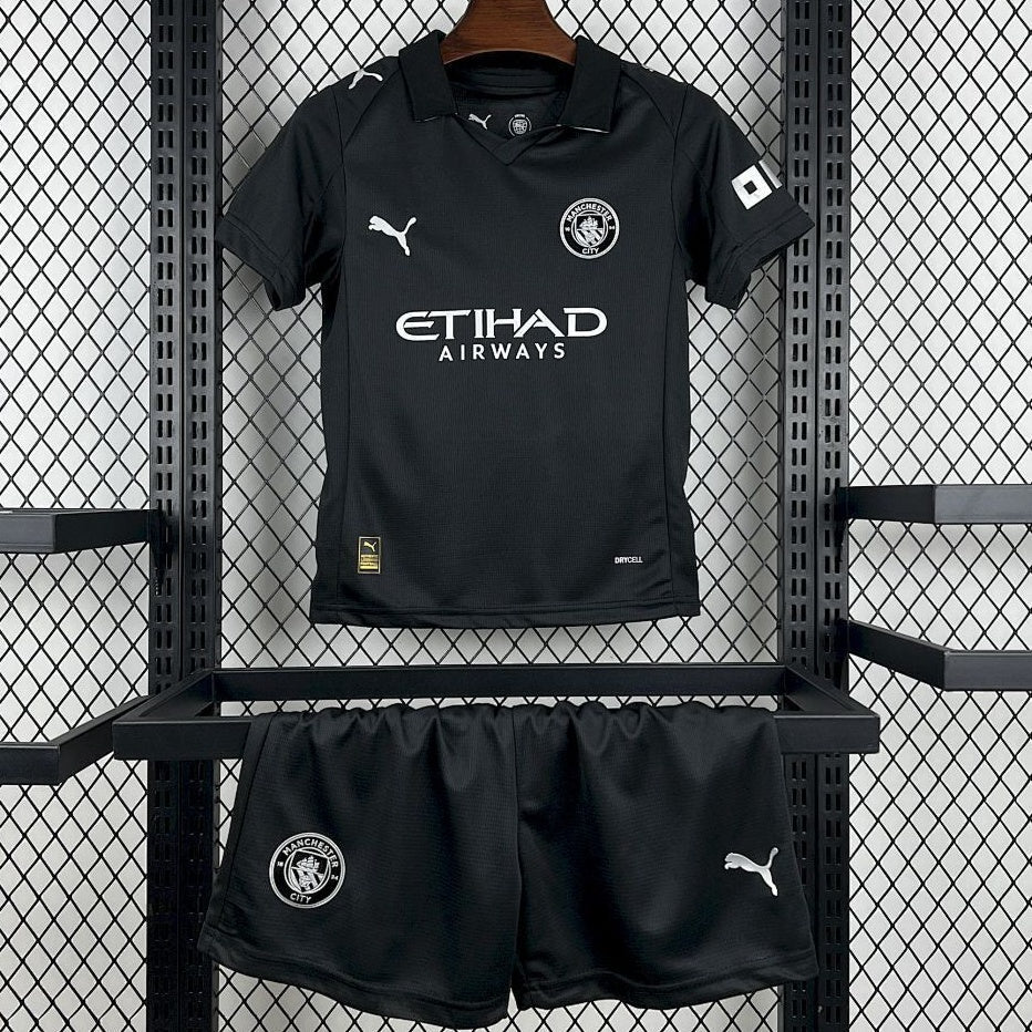 Ensemble enfant Manchester City extérieur, maillot Le 12-ème pour jeunes, coloris bleu et blanc, vue de face.
