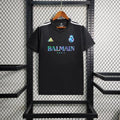 Maillot Real Madrid foot Balmain Noir 2023 2024, maillot de football noir avec logo et détails de la saison 2023-2024.