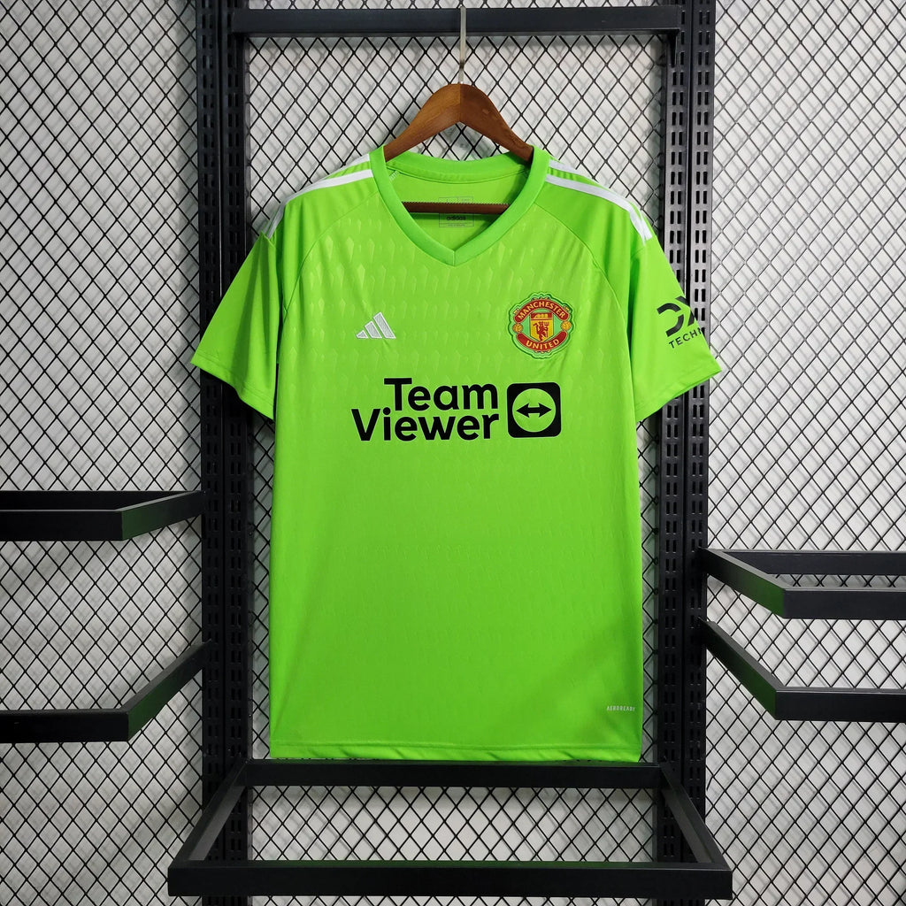 Maillot domicile Manchester United 2023 2024 de Le 12 -ème Maillot, vue de face avec logo et détails du maillot rouge.