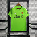 Maillot domicile Manchester United 2023 2024 de Le 12 -ème Maillot, vue de face avec logo et détails du maillot rouge.