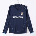 Maillot rétro extérieur Real Madrid 2005-2006, manches longues, marque Le 12 -ème Maillot, design classique et authentique.
