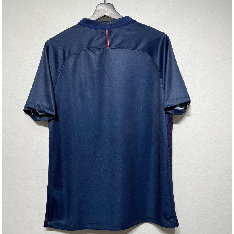 Maillot domicile rétro PSG 2016-2017 Le 12-ème Maillot, maillot de football bleu avec logo du club et détails blancs visible.