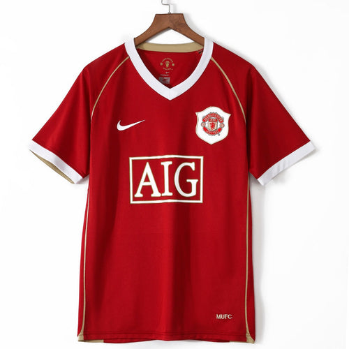 Maillot domicile rétro Manchester 2006-2007 Le 12-ème Maillot, maillot de football vintage Manchester United, style classique et logo visible.