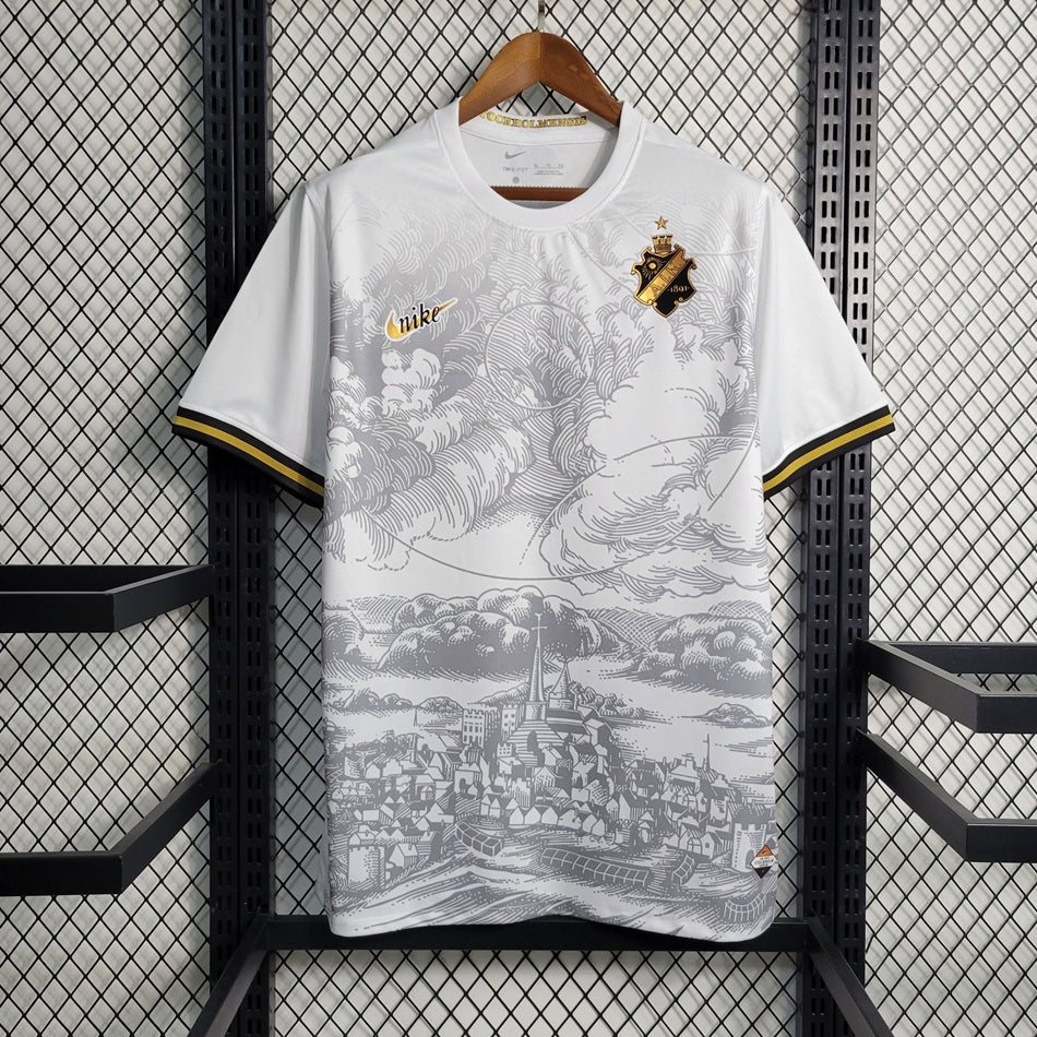 Maillot AIK Sonina 132ème anniversaire, édition spéciale de Le 12 -ème Maillot, en bleu avec logo et détails distinctifs.