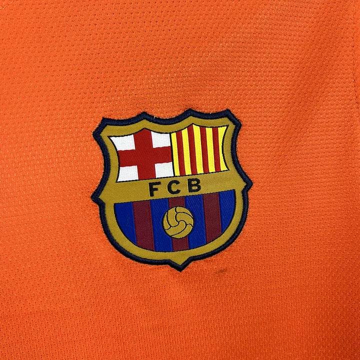 Maillot de football FC Barcelone 2012-2013 rétro Le 12-ème Maillot, vue de face avec logo et détails du maillot.