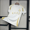 Maillot Al-Nassr troisième version 24/25 de la marque Le 12, maillot de football avec logo et détails colorés.