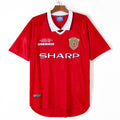 Maillot domicile rétro Manchester United 1999-2000 par Le 12, vue de face, avec logo et détails du maillot.