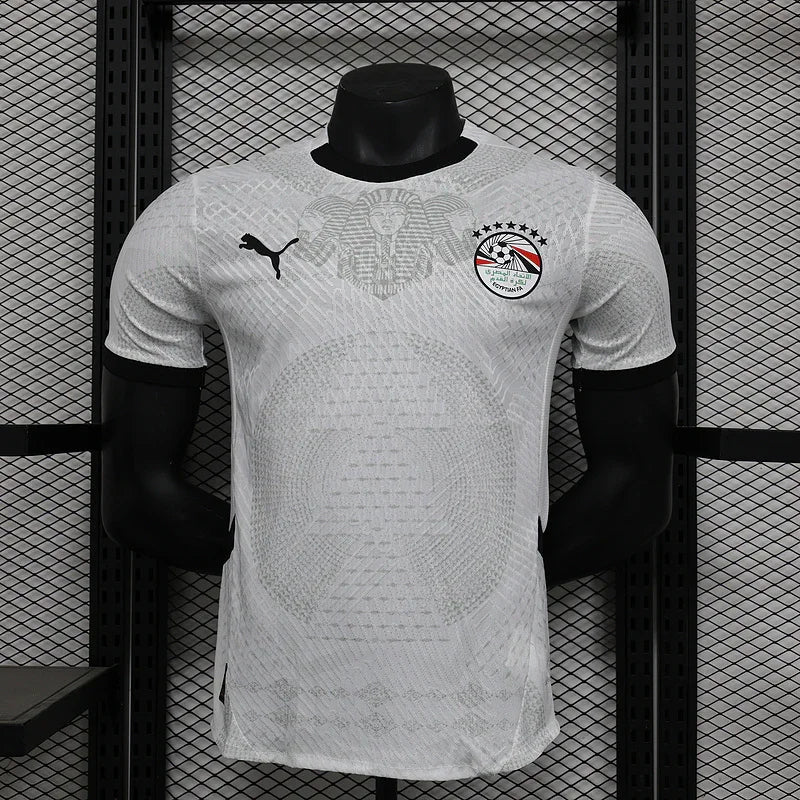 Maillot extérieur de l'Égypte pour la CAN 2025-26, marque Le 12 -ème Maillot, avec logo et design sportif visible.