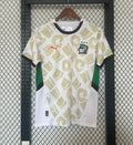 Maillot de football Côte d'Ivoire 2024-2025, marque Le 12 -ème Maillot, en bleu avec motifs et logo national.