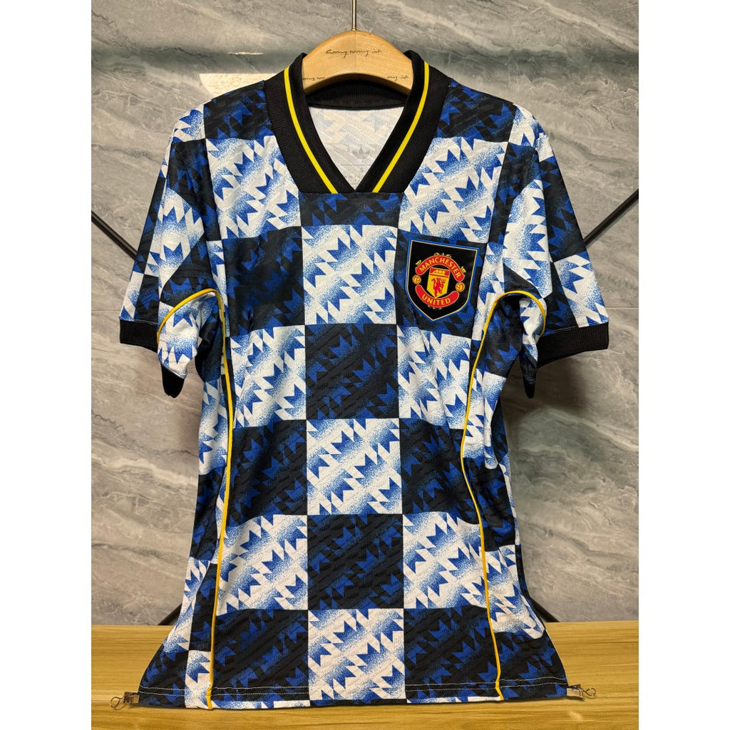 Maillot Manchester United 25/26 Le 12 -ème Maillot, maillot de joueur avec logo et détails officiels.