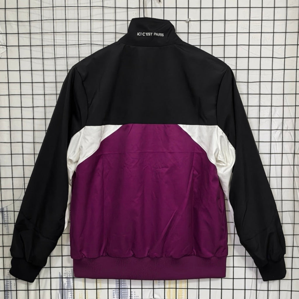 Veste coupe-vent réversible Le 12 -ème Maillot PSG, veste sportive avec logo PSG visible, couleurs contrastantes, style moderne