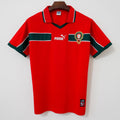 Maillot extérieur rétro 1998 Maroc de la marque Le 12, avec couleurs vives et logo du drapeau marocain.