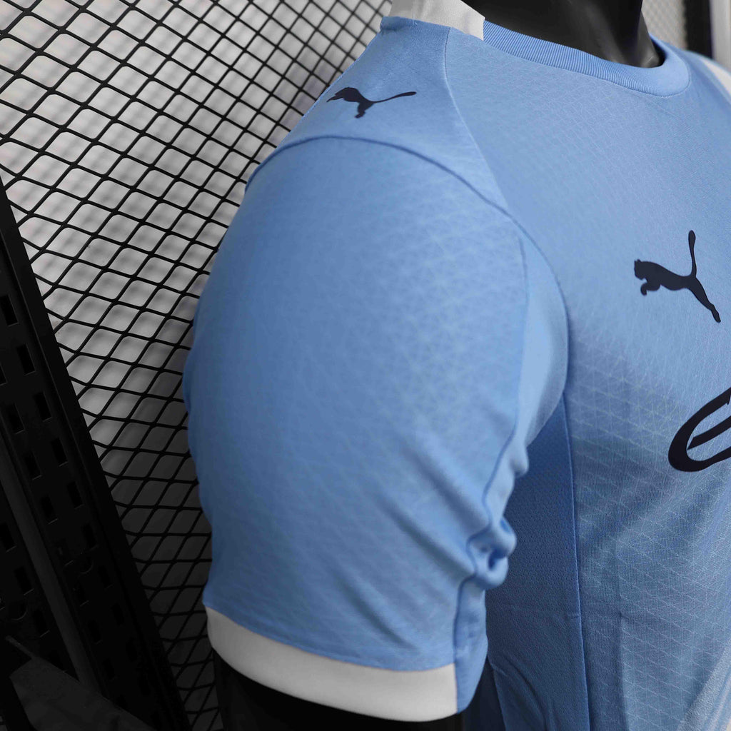 Maillot Manchester City 25-26 ans, maillot de football Le 12-ème Maillot, jersey officiel avec logo et couleurs du club.