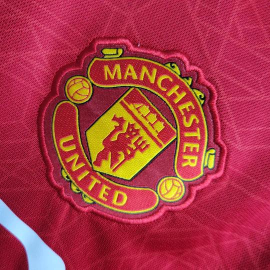 Maillot Manchester United 2023 2024 à manches longues, marque Le 12 -ème Maillot, modèle officiel pour la saison.