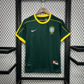 Maillot de football Brésil rétro 1998 de la marque Le 12 -ème Maillot, vue de face, détails du design coloré et logo officiel.