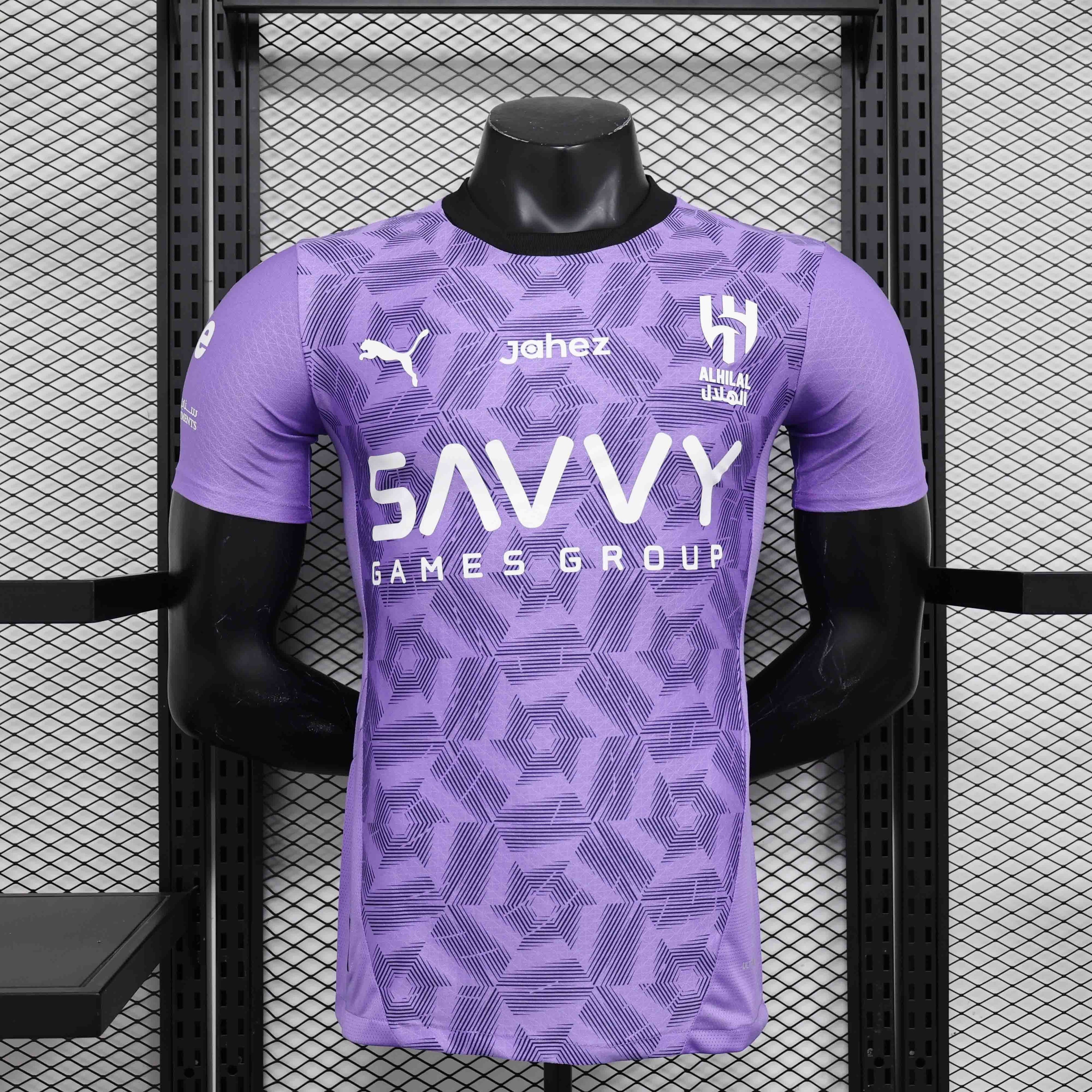 Maillot de football AL-Hilal 2024-25, maillot officiel de l'équipe, conçu par Le 12 -ème Maillot, devant avec logo et détails.