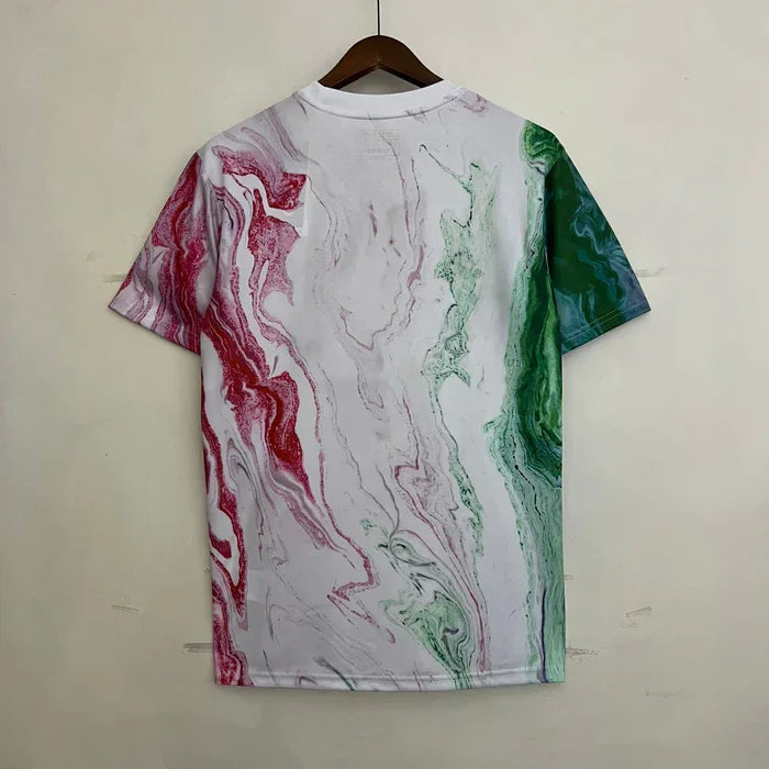 Maillot d'entraînement Italie 2023, marque Le 12 -ème Maillot, tissu bleu avec logo et détails sportifs visibles.
