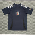 Maillot de football 25/26 Japon Le 12 -ème Maillot, noir, détails sportifs, vue frontale.