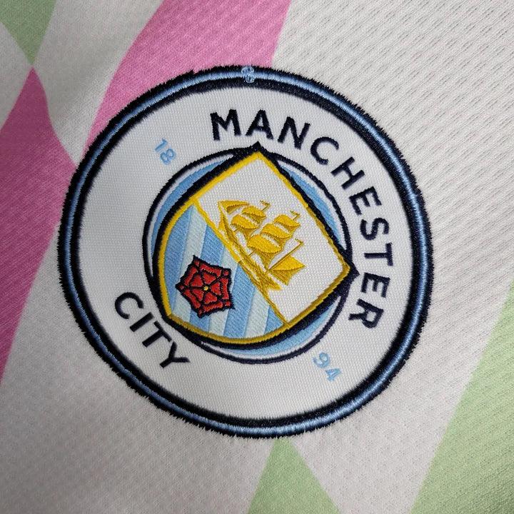 Maillot d'entraînement Manchester City 2023-2024 Le 12ème Maillot, jersey vert avec logo du club et détails de sport.