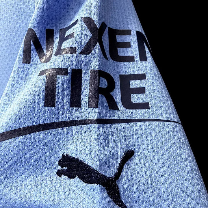 Maillot domicile Manchester City 2022/23 Le 12 -ème Maillot, maillot de football avec logo et design officiel de la saison.