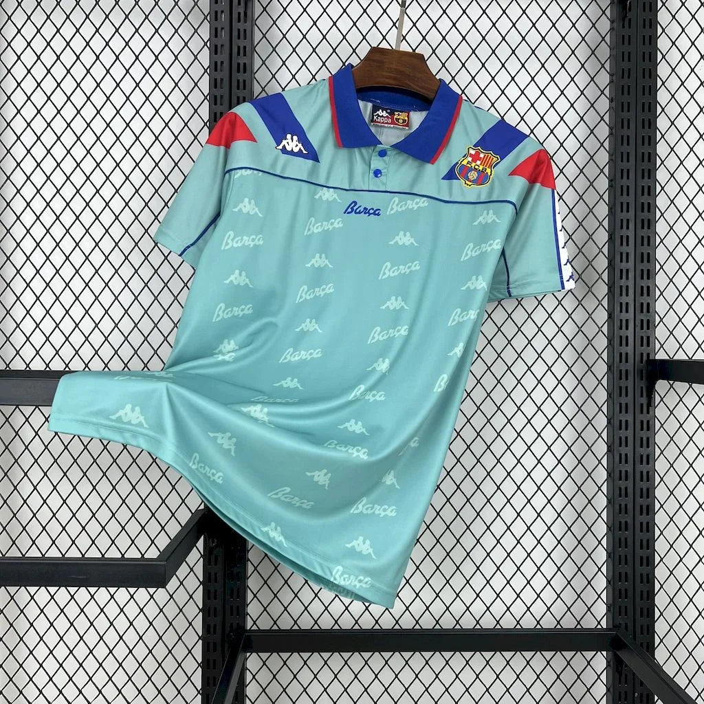 Maillot de football FC Barcelone 1992-1995 rétro, fabriqué par Le 12 -ème Maillot, vue de face avec le logo du club.