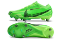 Crampons Mercurial Vapor XV Elite de Le 12 -ème Maillot, vue détaillée montrant la semelle et les pointes pour le football.