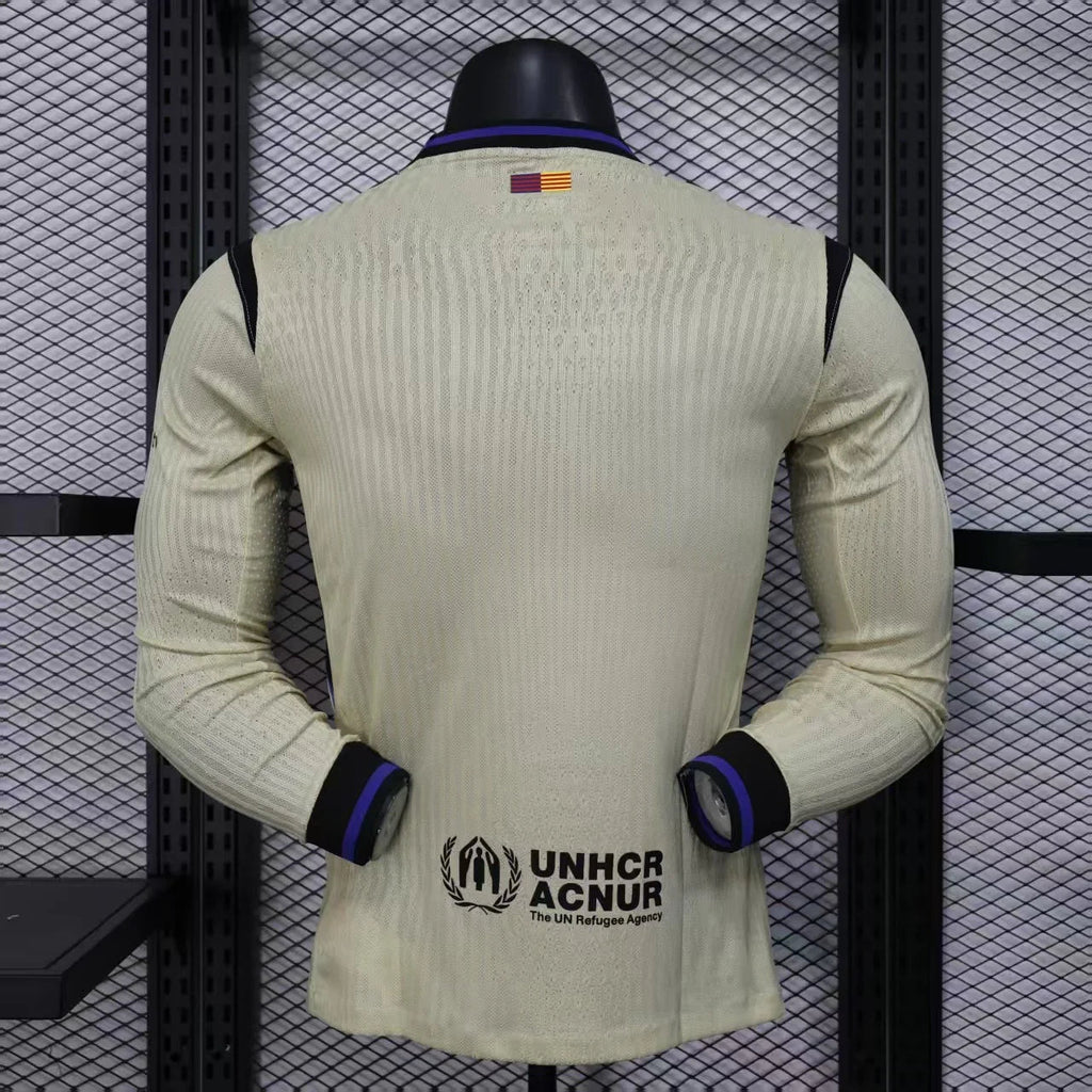 Maillot extérieur à manches longues FC Barcelone 2025-26 Le 12, maillot de football avec logo blaugrana sur fond bleu.