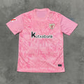 Maillot de football Athletic Bilbao 25/26 rose, signé Le 12 -ème Maillot, vue de face avec logo et détails de l'équipe