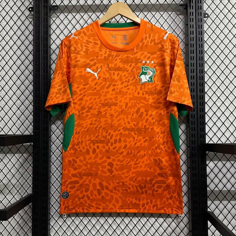 Maillot de football Côte d'Ivoire 25/26, marque Le 12-ème, en tissu bleu avec logo et détails officiels.