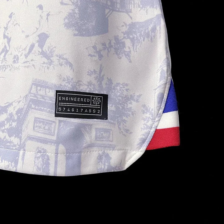 Maillot extérieur de l'équipe de France 2022-2023, marque Le 12, avec logo et design de la Coupe du Monde.