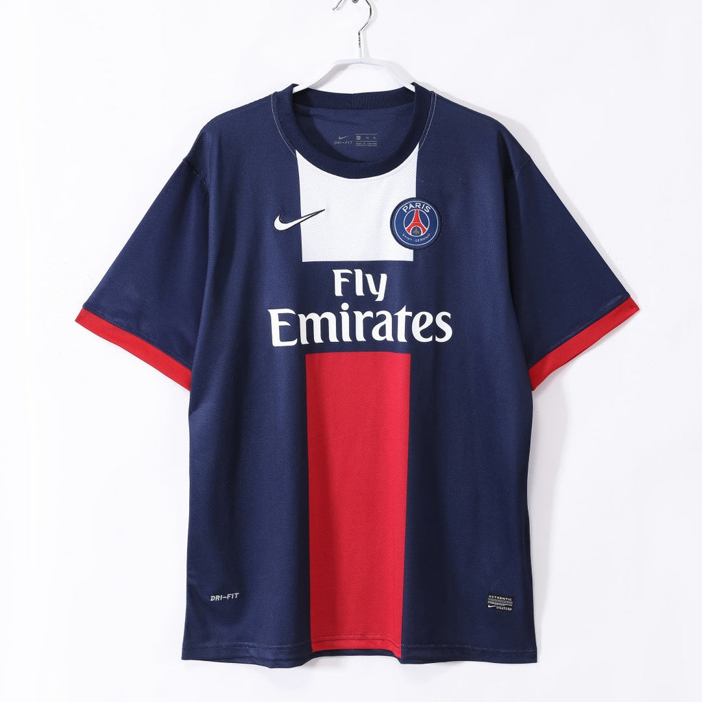 Maillot domicile rétro du PSG 2013-2014, marque Le 12 -ème Maillot, avec logo du club et design classique.