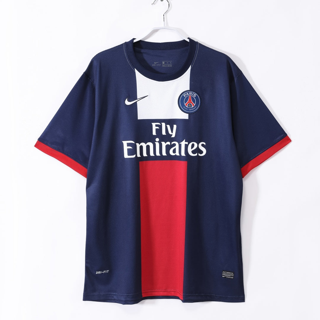 Maillot domicile rétro du PSG 2013-2014, marque Le 12 -ème Maillot, avec logo du club et design classique.
