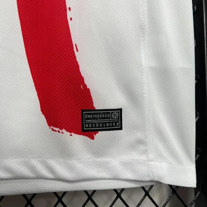 Maillot Paris Saint Germain saison 2023-2024 édition spéciale, maillot de football Le 12 -ème Maillot, logo et design visibles.