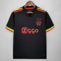 Maillot AJAX 21/22 Third de la marque Le 12 -ème, vue de face avec logo et motifs colorés sur le maillot.