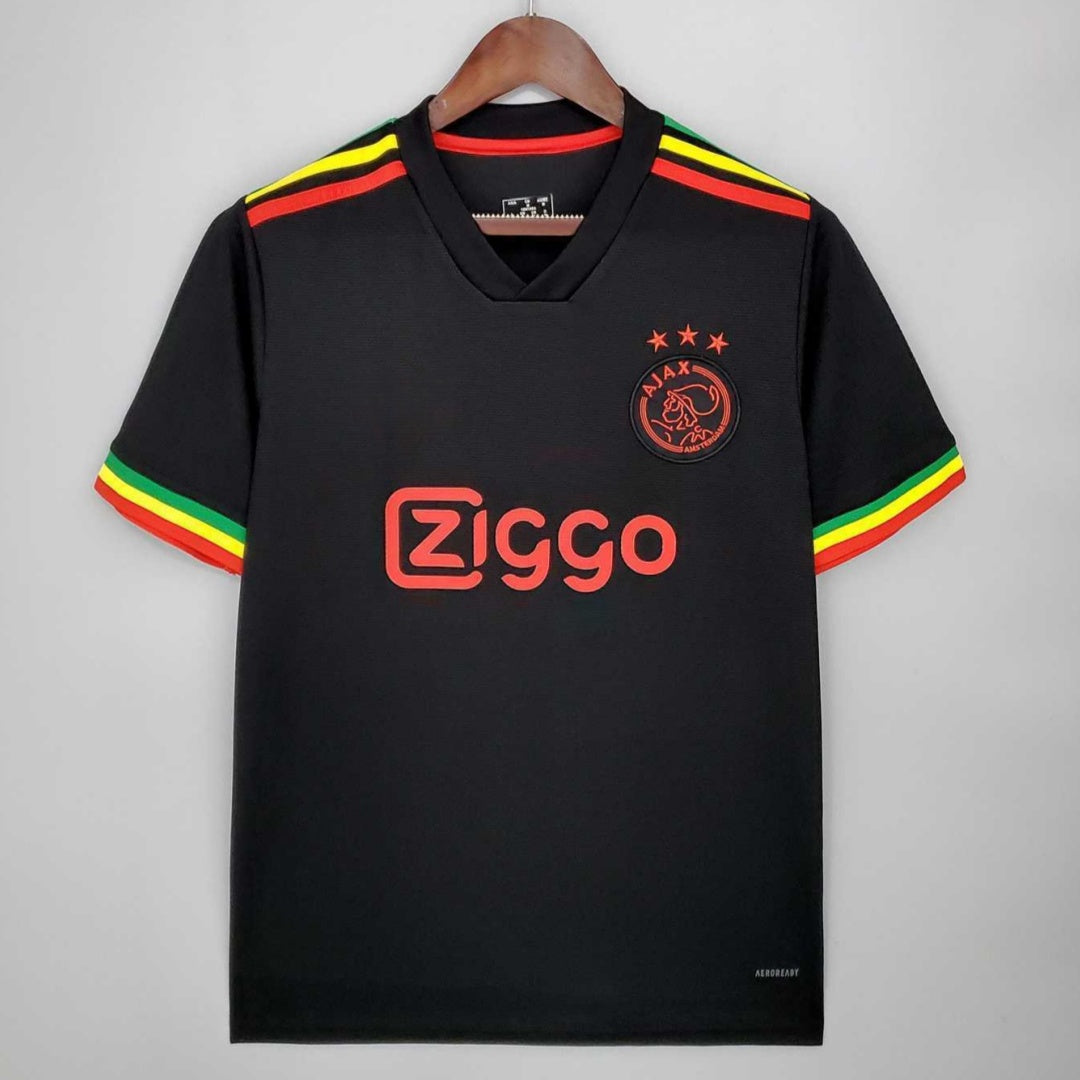 Maillot AJAX 21/22 Third de la marque Le 12 -ème, vue de face avec logo et motifs colorés sur le maillot.