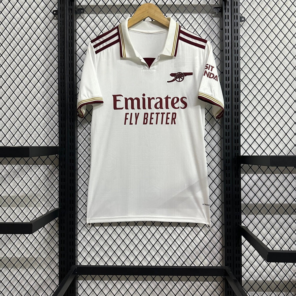 Maillot third Arsenal 25/26 de Le 12 -ème Maillot, maillot de football avec logo et design orange et noir.